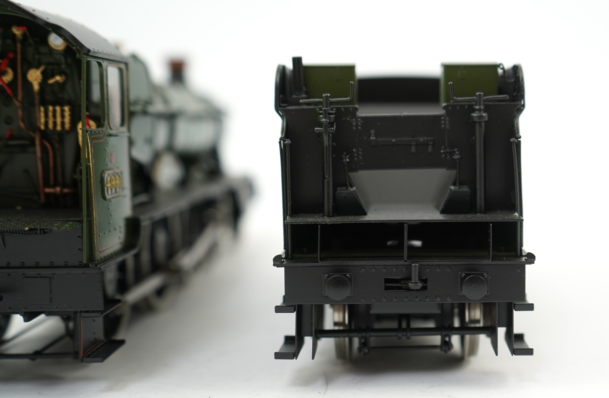 An 0 Gauge Made by Sancheng, China, model of GWR Hall Class, Cobham Hall 4991, 4-6-0 tender locomotive, powered for two rail operation.